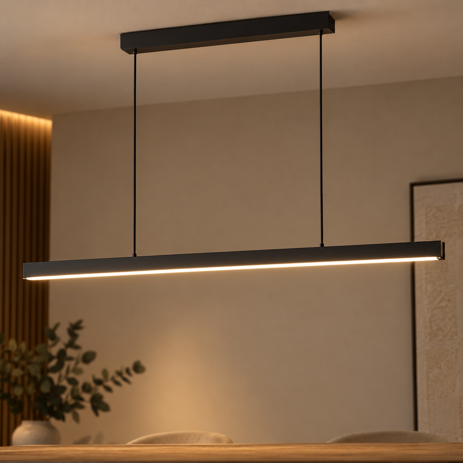 Linear LED pendant light above a dining table