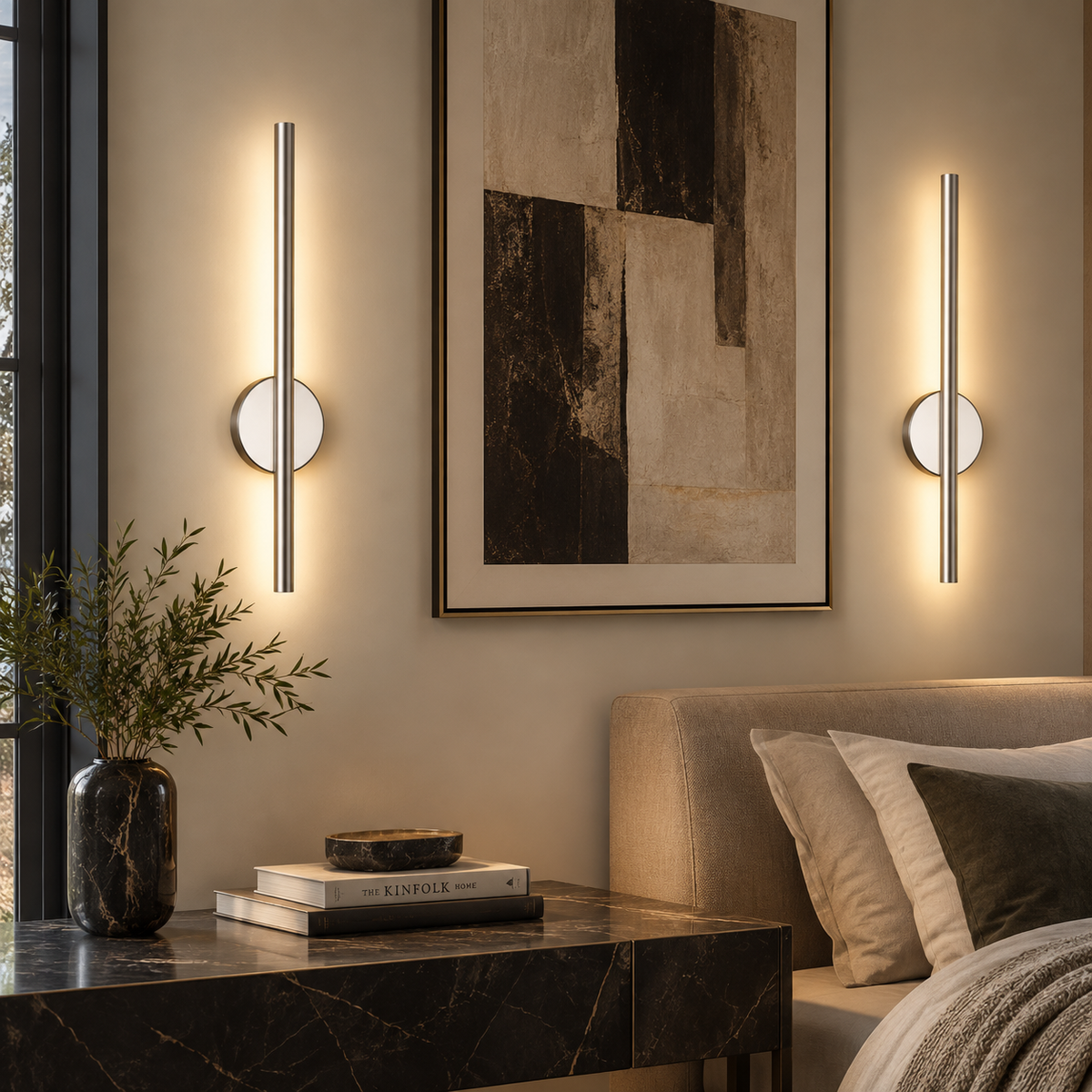 Pair of Orla rechargeable rotating LED wall lights in a bedroom