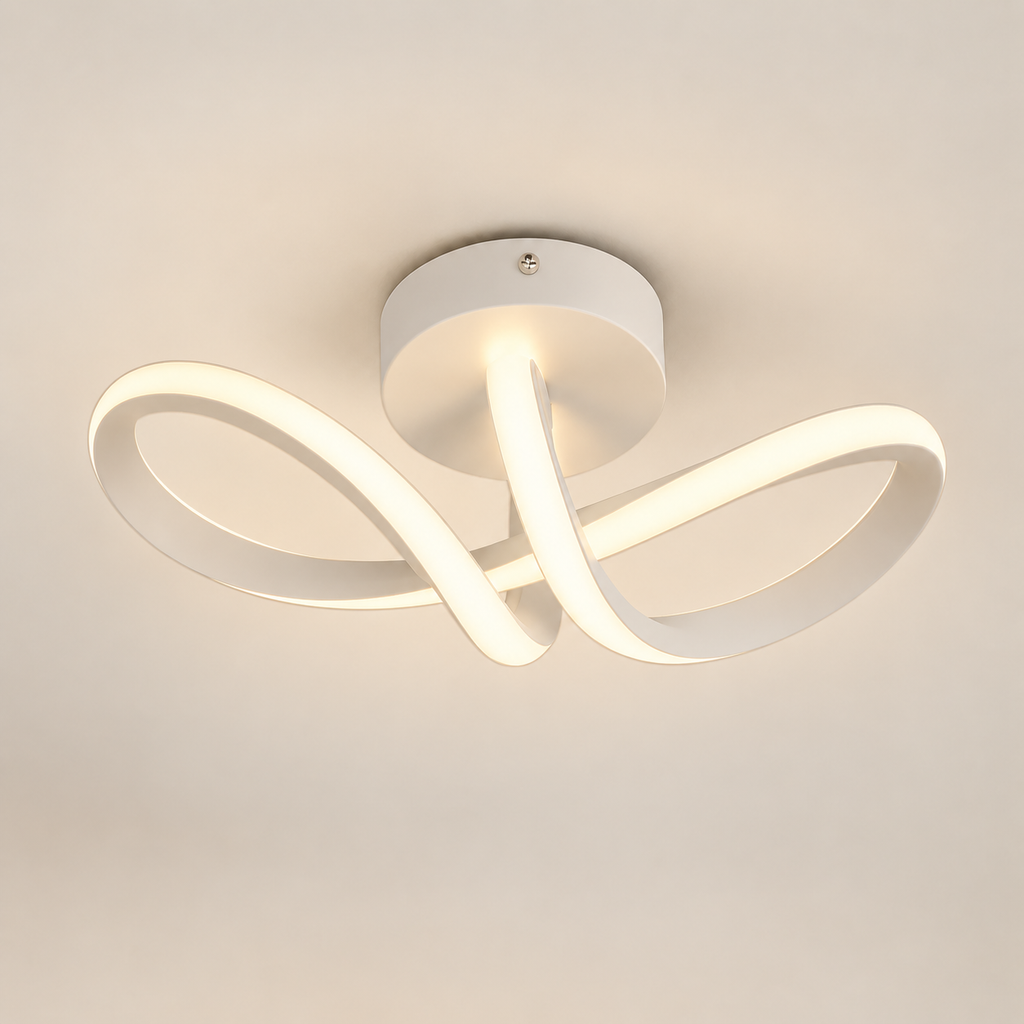 Arca curved ribbon LED ceiling light, lit, on a greige studio background