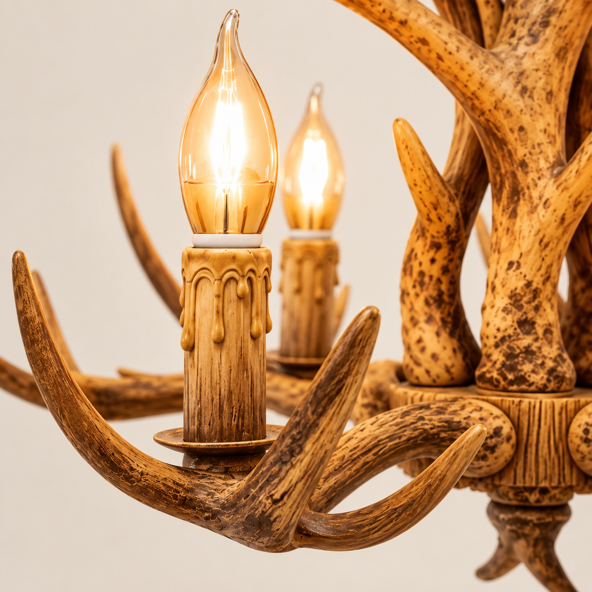 Close-up of the Cervara faux-antler arms and candle-style lights