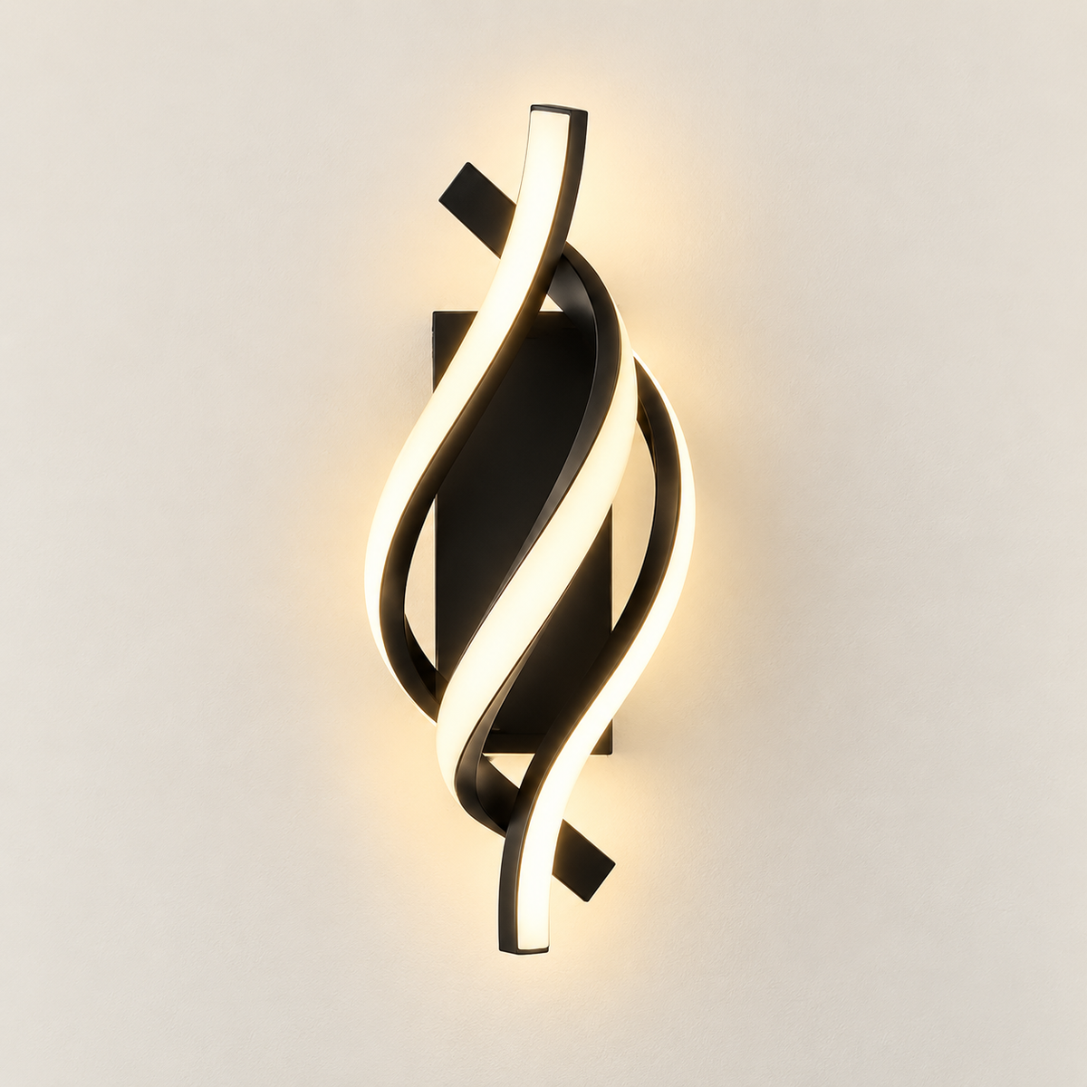 Elara sculptural LED wall light in matte black, switched on