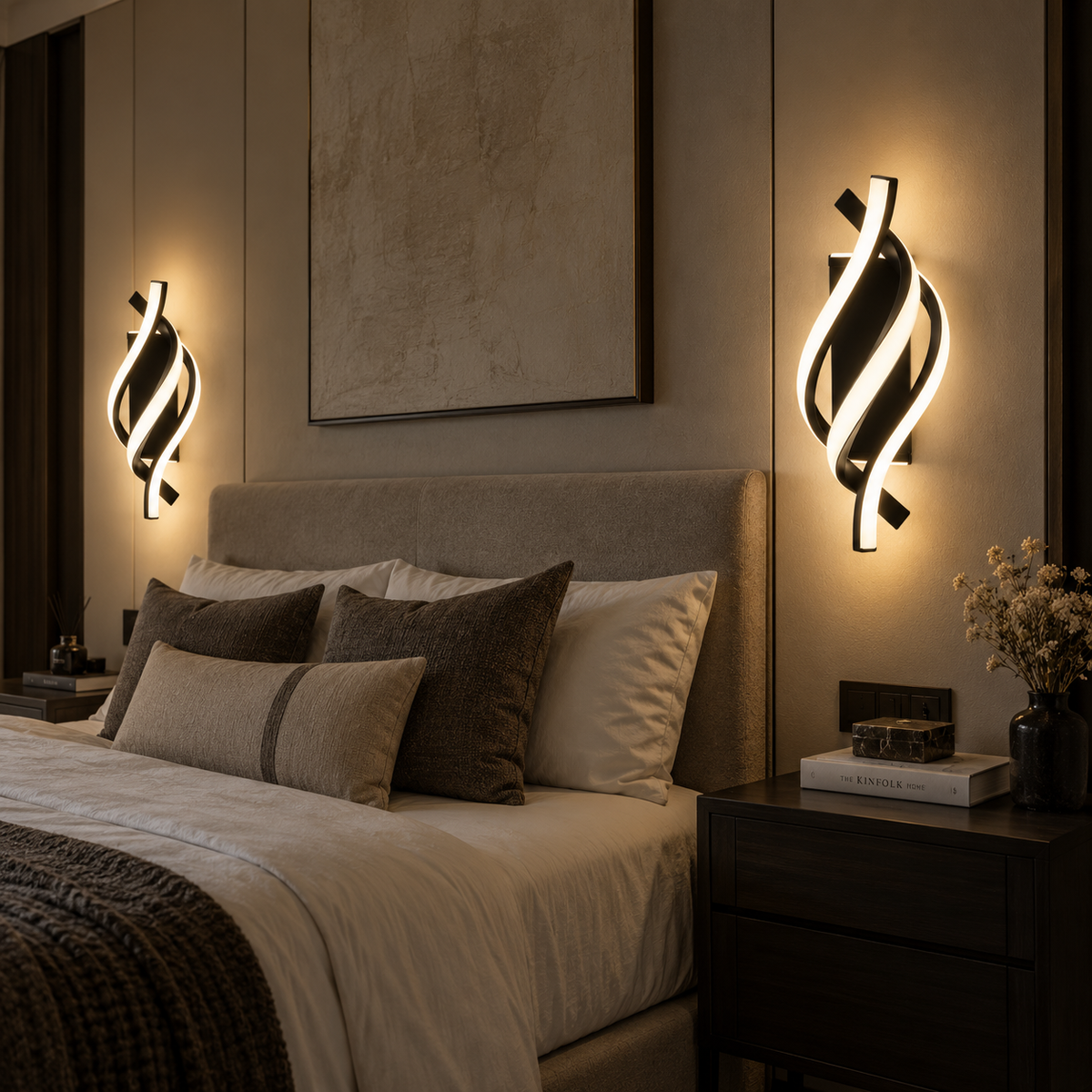 Pair of Elara sculptural wall lights above a bed
