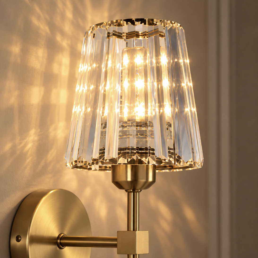 Close-up of the Estelle faceted crystal shade and brushed gold stem