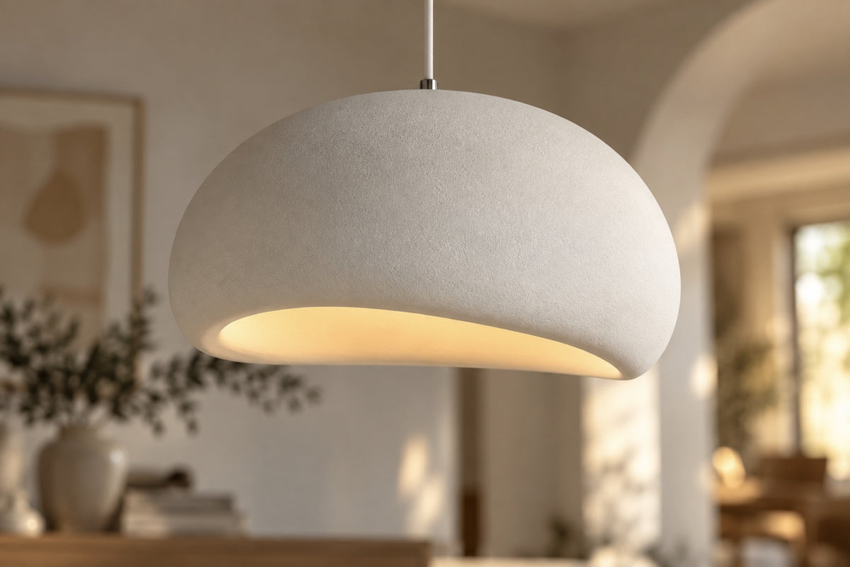 Close-up of the sand-like textured finish of the Kaela wabi-sabi dome pendant