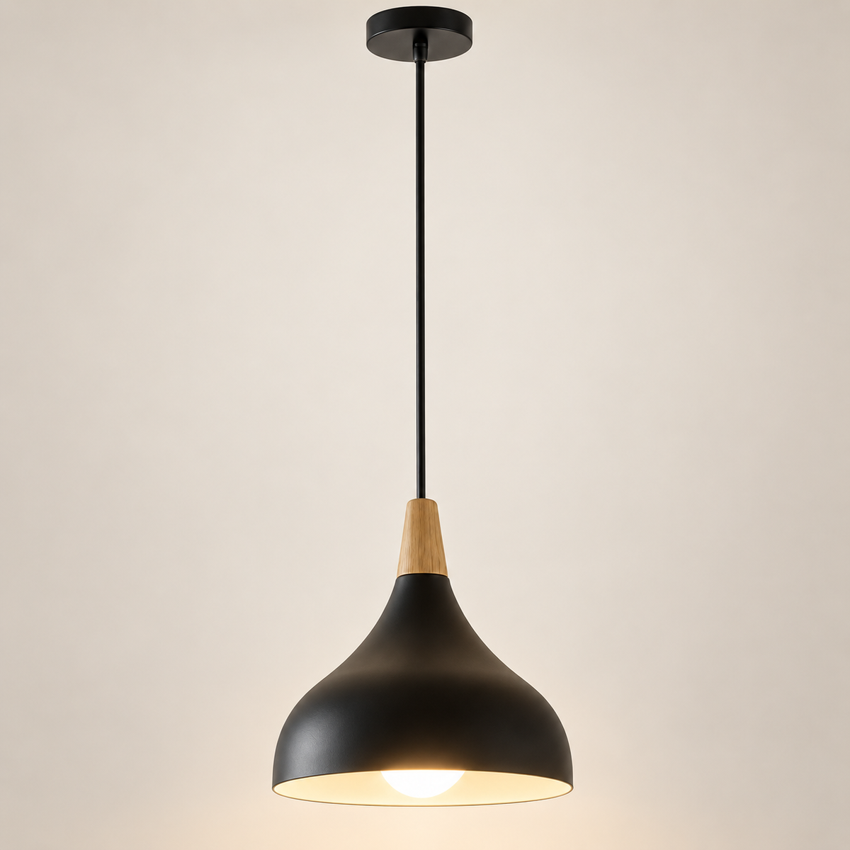 Linnea Scandinavian cone pendant light in black with wooden neck, on a greige studio background