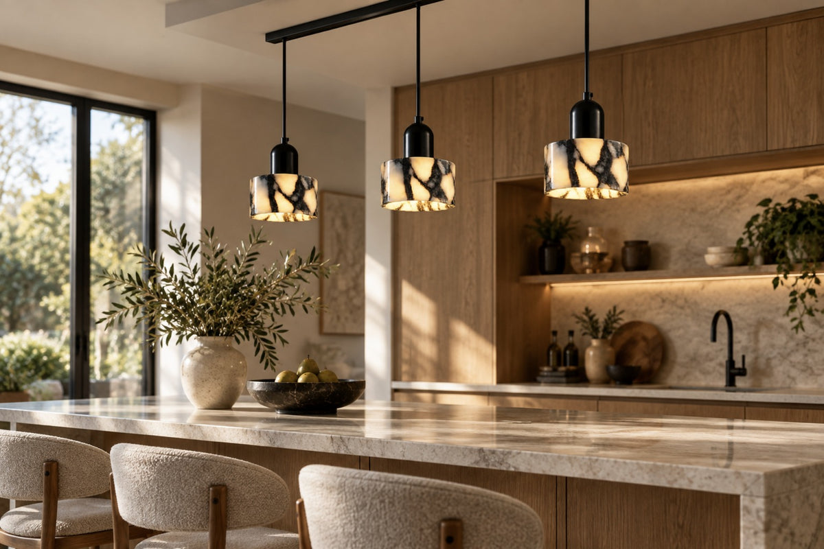 Three-head Marra natural stone pendant above a kitchen island