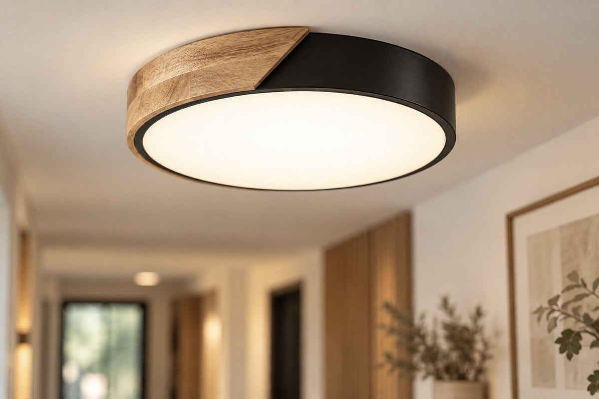 Close-up of the Nero black and wood LED ceiling light and its acrylic diffuser