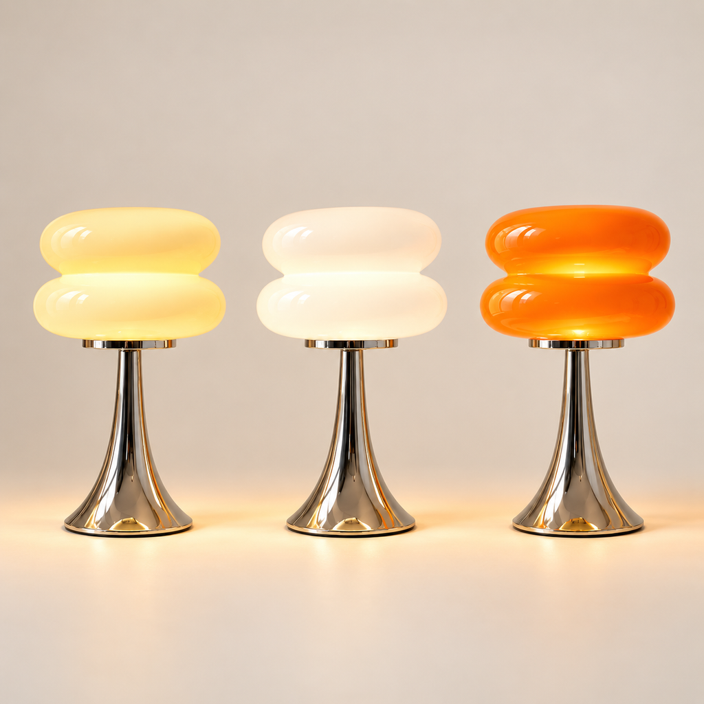 Nuvola stacked glass table lamp in cream, white and orange, lit side by side