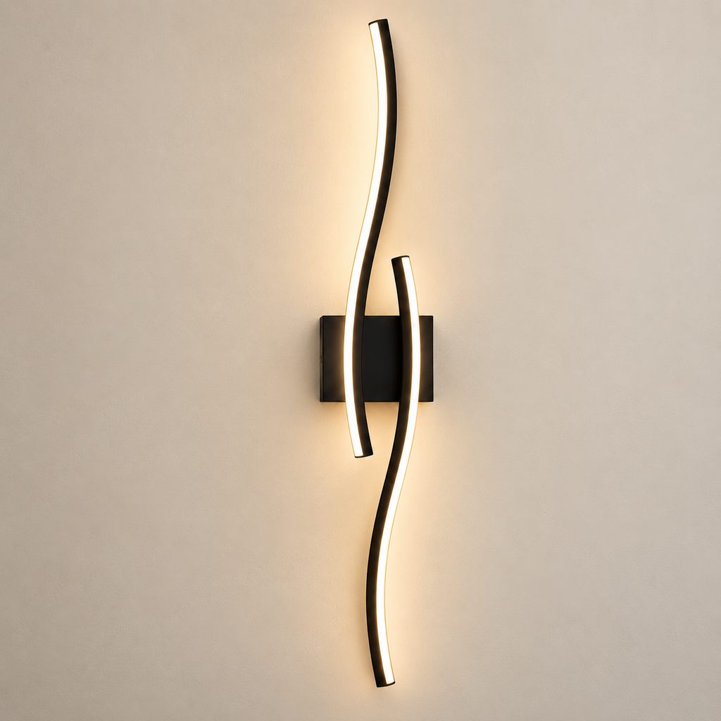 Onda black wave LED wall light, lit, on a greige wall