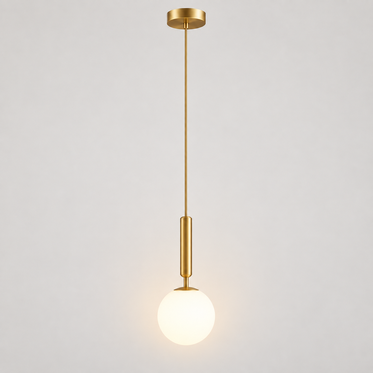 Orbis opal globe pendant light in gold, lit