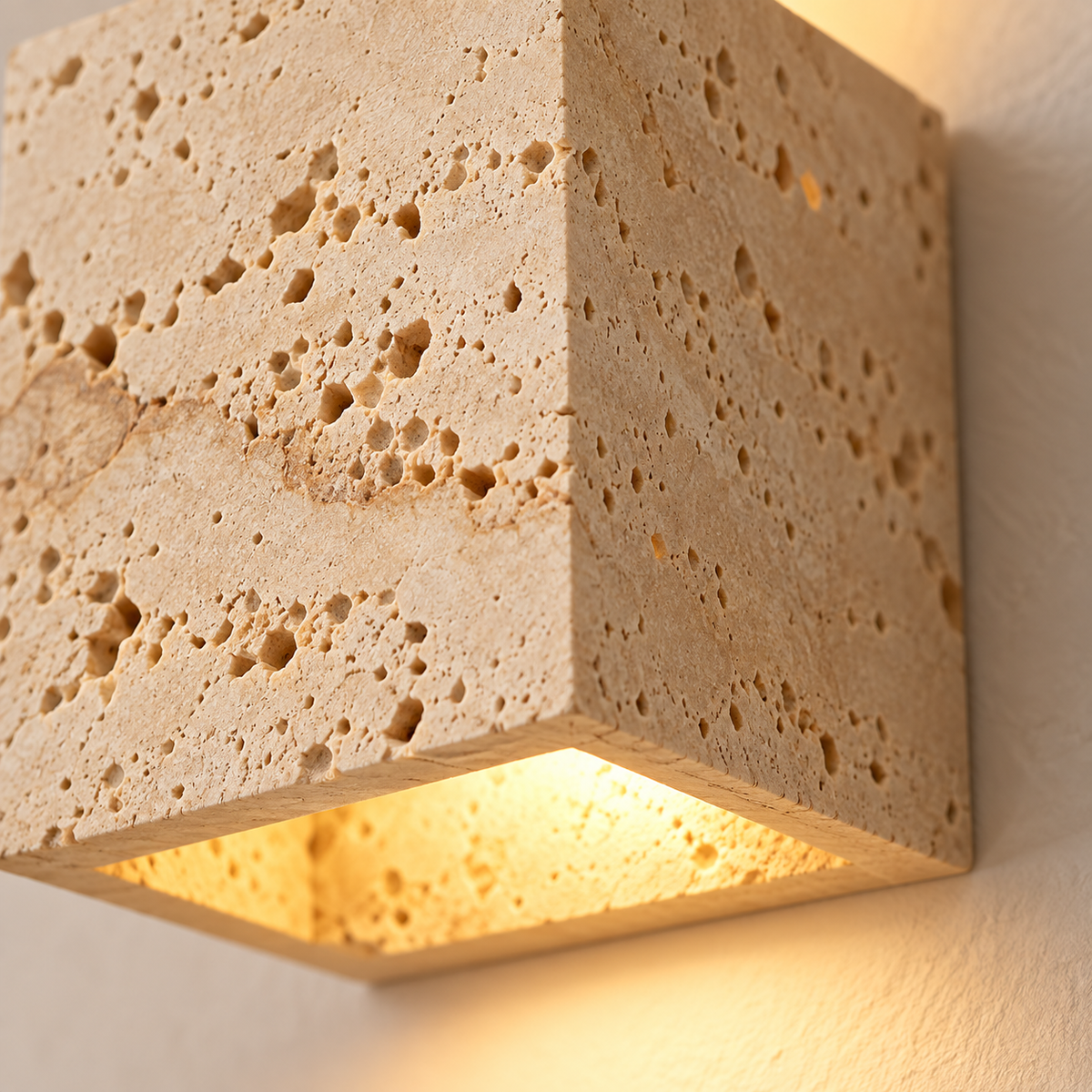 Close-up of the Petra's natural travertine pores and warm glow
