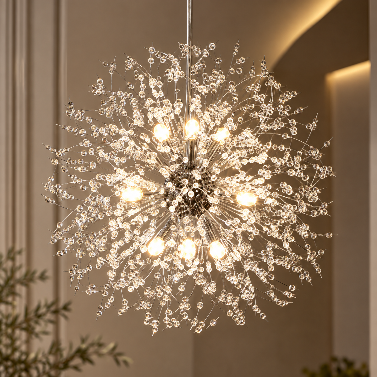 Close-up of the Stellia crystal dandelion chandelier switched on