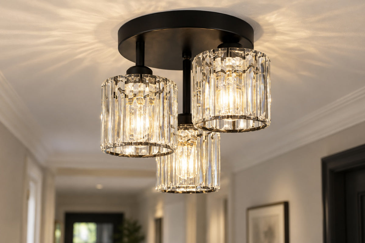 Close-up of the Valtera prism-cut crystal shades and black frame, lit